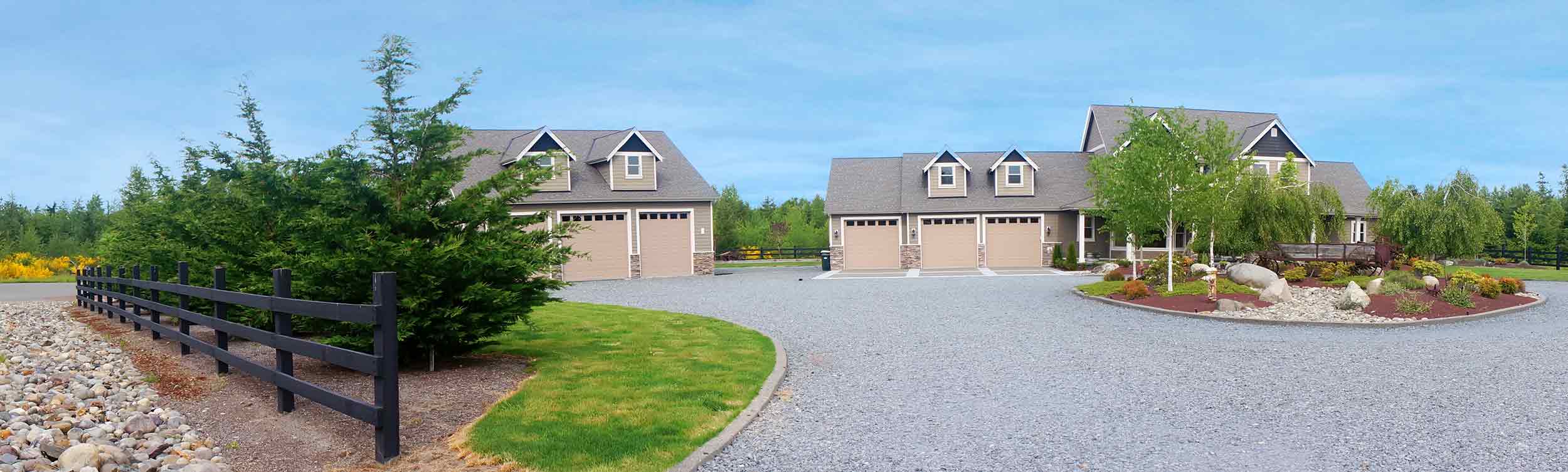 Fence with flowering plants by Finer Lawn & Landscaping